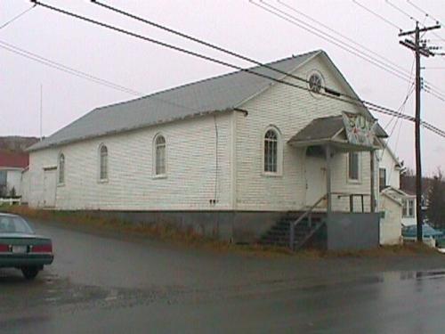 View of the left and front facades of Victoria Hall, Twillingate, NL. Photo taken circa 1993.; © HFNL 2010