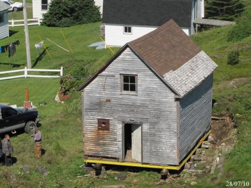 View of the right and rear facades of Ashbourne's Lower Trade General Store, Twillingate, NL. Photo taken 2010. ; © Isles Wooden Boat Building Committee 2010