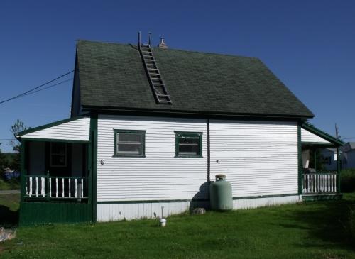 View of the rear facade of Pelley House, Boyd's Cove, NL. Photo taken 2011. ; HFNL 2011