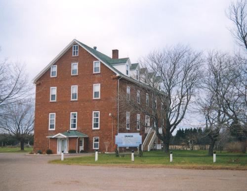 Showing Georgian style front and side elevations; Acadian History Committee, 1999