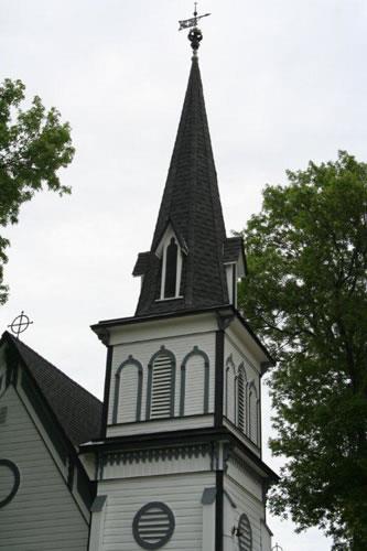 Detail of spire over the entrance porch of Holland Emmanuel Historical Church, Holland, 2013.; Historic Resources Branch, Manitoba Culture, Heritage and Tourism, 2013