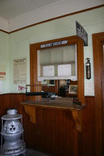 View of ticket wicket in waiting room of the Morden Canadian Pacific Railway Station, Morden, 2011; Historic Resources Branch, Manitoba Culture, Heritage and Tourism, 2011