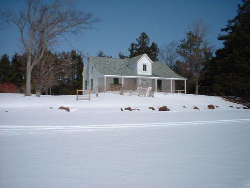 Photo of the Richibucto Marine Hospital south elevation taken from the Richibucto River; Village of Rexton 2004