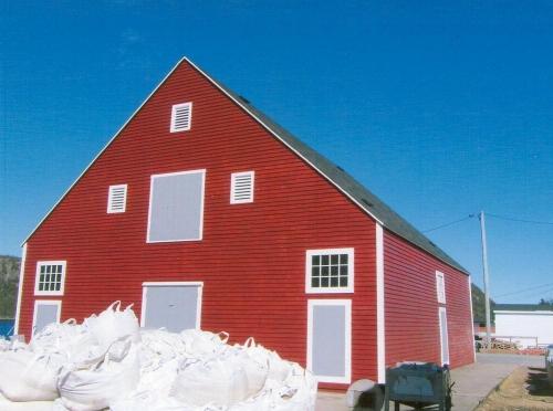 View of the front and right facades of Newman's Fish Store, Gaultois, NL.; © HFNL 2013 
