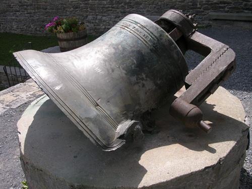 Church bell, damaged by fire and situated in St. Raphael's Church Ruins, 2005; OHT, 2005