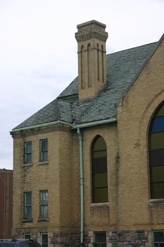 West facade showing detail of brickwork of the First Baptist Church, Brandon 2013; Historic Resources Branch, Manitoba Tourism, Culture, Heritage, Sport and Consumer Protection, 2014