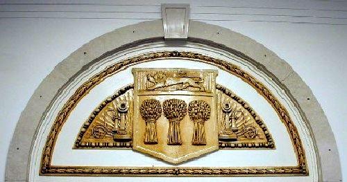 Close-up of moulded provincial crest and telephone motif, 2000; Government of Saskatchewan, 2000.