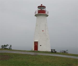 General view of Cape George Lighthouse showing its balanced proportions and elegant profile, 2012.; Kraig Anderson - lighthousefriends.com