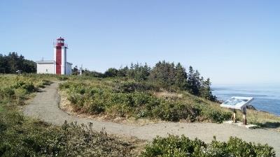 View of Prim Point Lighthouse showing its square reinforced-concrete tower attached to the single-storey concrete block fog alarm building.; Robert Hersey