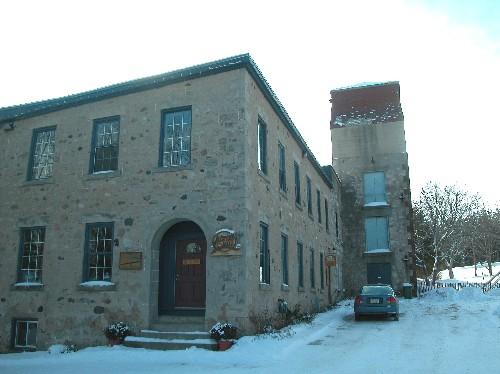 Two-Storey stone mill building and three-storey water tower.; Sally Drummond, Town of Caledon