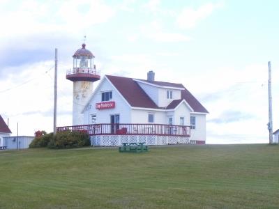 General view of Cap de la Madeleine Lighthouse in summer; Arlette Fortin