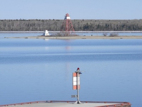 General view showing Gull Harbour (1898) Lighthouse - a square, tapered, wooden tower - and, on its right, Gull Harbour (1926) Lighthouse; Marvin Benson