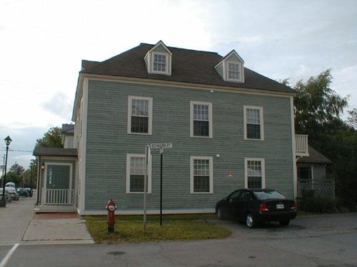 This image of the building presents the rectangular massing and overall restraint and lack of ornamentation. ; PNB 2005