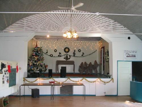 View of stage at north end of hall, 2004.; Government of Saskatchewan, Marvin Thomas, 2004.