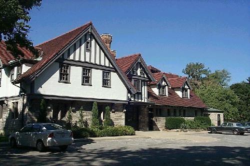 Willistead's 2-1/2-storey coach house complements the
grand manor house with similar external materials (half-timbering, stone, brick and ornate wood ), quality workmanship and design.; City of Windsor, Planning Department