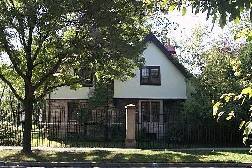 Willistead's 1-1/2 storey gate house located at the
entrance to the estate, which is enclosed by an iron fence with limestone piers, originally served as a gardener's cottage.; City of Windsor Planning Department
