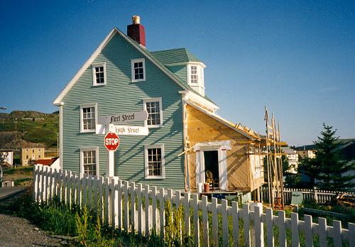 View of right gable end of the Nathaniel Morris House, Trinity, NL, showing the restoration work on the linhay (rear extension) and five sided dormer on rear.; HFNL 2005
