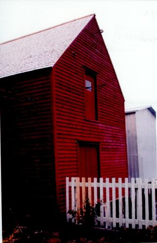 Exterior photo of Grant's Stage, Trinity, Trinity Bay, NL.  Photo showing water-facing side of building.; HFNL 2005