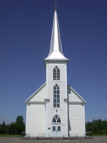 This image illustrates the wooden Gothic-style pointed arch windows, doors, and mouldings. ; PNB 2005