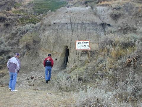 Entrance to cave where outlaws reportedly hid from the authorities, 2003.; Government of Saskatchewan, Carlos Germann, 2003.