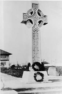 View of the Richmond Cenotaph with wreath showing part of Municipal Hall behind, c.1945; Richmond Archives No. 1977 218