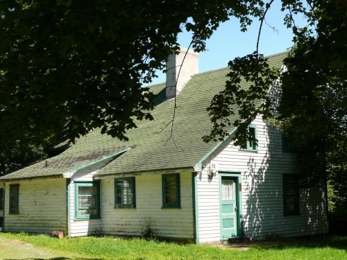 The rear facade has traditionally been the main entrance to most Newfoundland homes.  Thimble Cottage has two rear entrances. Photo taken August 7, 2007.; Deborah O'Rielly/ HFNL 2007