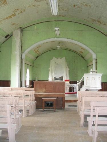 View of church interior, featuring pressed copper tile and ornate pulpit, 2004.; Government of Saskatchewan, Lisa Dale-Burnett, 2004.