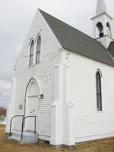 This image presents the south transept with Neo-Gothic elements including the stylized buttresses on each corner and double lancet window located over the front entrance, facing the river.; PNB 2005