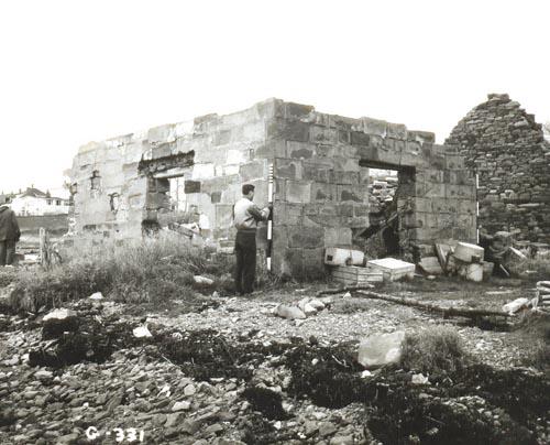 Historical image of LeNoir Forge, Arichat, surving the remains of the building, 1963.; Parks Canada, Fortress of Louisbourg, National Historic Site of Canada, photographer unknown, 1963.