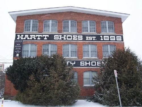 North elevation showing painted sign ; City of Fredericton