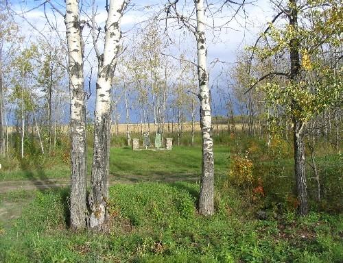View east at site area and interpretive plaque, 2004.; Government of Saskatchewan, Marvin Thomas, 2004.
