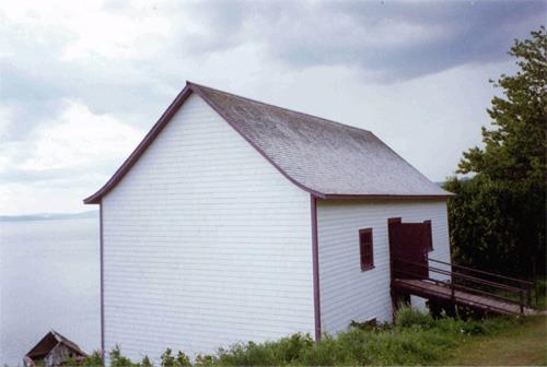 Southern view of the Hyman Warehouse, 1992.; Parks Canada Agency / Agence Parcs Canada