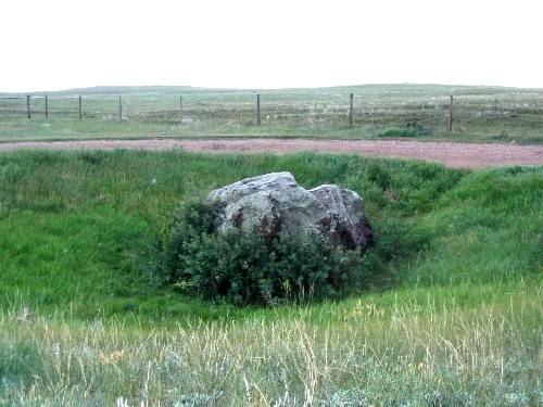 Close-up view of rubbing stone and encircling rut, 2004.; Government of Saskatchewan, Michael Thome, 2004.