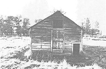 Side View of Livestock Shed, showing the varied sized lumber used for its construction, 1992.; Public Works Canada, Architectural & Engineering Services - Canadian Parks Services, Western Regional Offices/ Ministère des Travaux publics, Services d'architecture et de génie, Service canadien des parcs, Bureau de la région de l'Ouest, 1992.