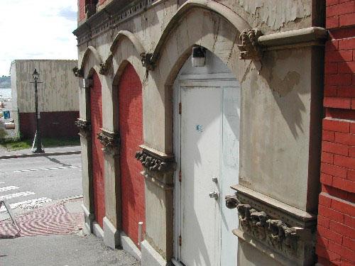 Photograph showing the arches on Princess Street with their figurines and gargoyles, 2004.; City of Saint John 