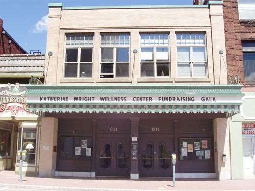 Now restored to its splendour of the 1920's, the Capitol Theatre's marquee and façade cast their shadow on Main St., Moncton.; Moncton Museum