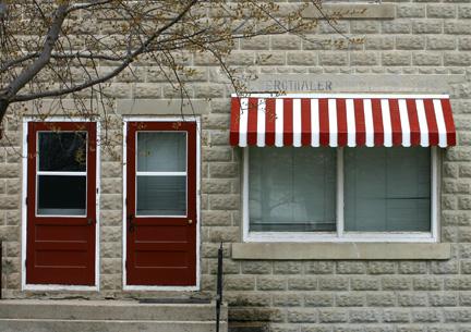 Detailed View of the original signage on the Bergthaler Waisenamt, Altona 2005; Historic Resources Branch, Manitoba Culture, Heritage & Tourism, 2005