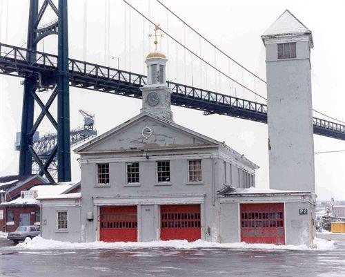 HMC Dockyard Clock on dockyard fire hall, Halifax Dockyards, Halifax, Nova Scotia, 1986.; HMC Dockyard, base photographic section, CFB Halifax, Halifax, NS, 1986.
