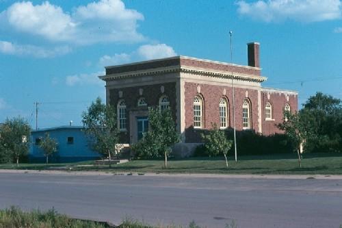 Looking southeast at front and side elevations, 1979.; Government of Saskatchewan, Frank Korvemaker, 1979.
