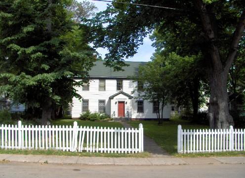 Showing setting of house with spacious grounds and picket fence; City of Charlottetown, Natalie Munn, 2005