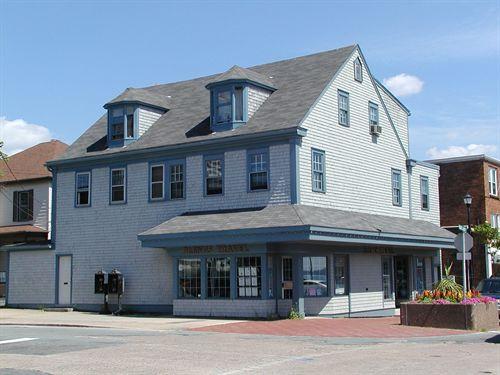 Side and front elevation from the corner of Queen and Portland Streets, Owl Drug Store, Dartmouth, Nova Scotia, 2005.; HRM Planning and Development Services, Heritage Property Program, 2005.