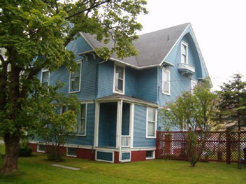 Rear and side elevations showing balcony under attic window, Lawson House, Yarmouth, 2004.; Heritage Division, NS Dept. of Tourism, Culture and Heritage, 2004.