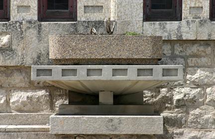 Detailed view of a stone urn on the Stonewall Dominion Post Office, Stonewall, 2005; Historic Resources Branch, Manitoba Culture, Heritage, Tourism and Sport, 2005