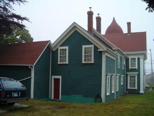 Rear elevation showing addition and carriage house, Lovitt House, Yarmouth, 2004.; Heritage Division, NS Dept. of Tourism, Culture and Heritage, 2004.