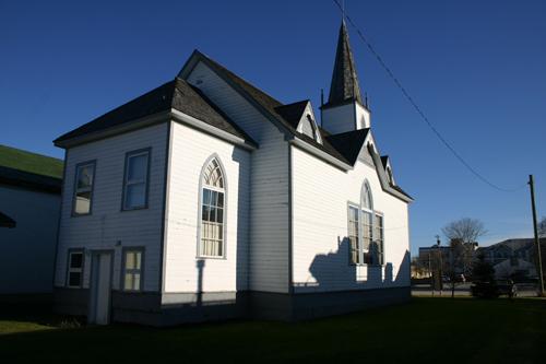 View, from the southwest, of the south and west elevations of Gimli Unitarian Church, Gimli, 2005; Historic Resources Branch, Manitoba Culture, Heritage, Tourism and Sport, 2005
