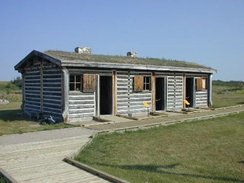 Vew northwest at reconstructed Men's House, 2004.; Government of Saskatchewan, Marvin Thomas, 2004.