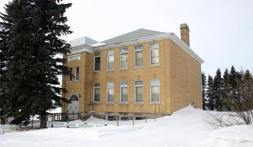 View of main elevation, from the northeast, of Darlingford Consolidated School, Darlingford, 2005; Historic Resources Branch, Manitoba Culture, Heritage, Tourism and Sport, 2005