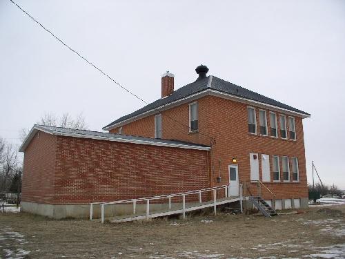 View of the 1927 rear addition (version of front façade) and 1960 addition, 2003.; Government of Saskatchewan, Jennifer Bisson, 2003.