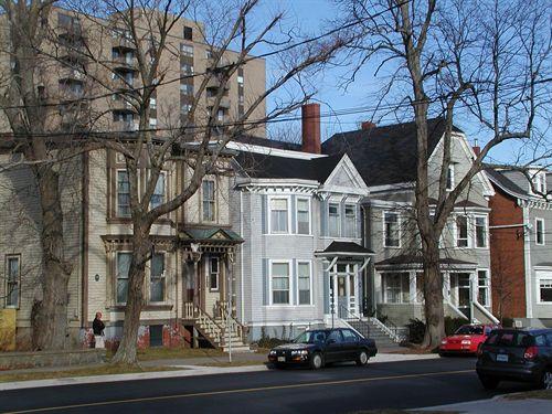 5651 - 5691 Inglis Street,Halifax, Nova Scotia, 2004. Note the Late Victorian Eclectic style, Queen Anne porjecting bays, hooded entrance, two bay facade.; HRM Planning and Development Services, Heritage Property Program, 2004.