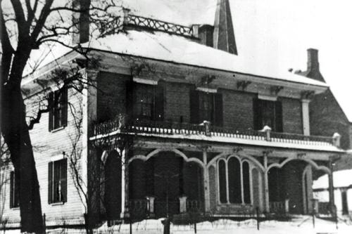 This photo, which was taken in the 1930's, shows the original "widow's walk" roof and verandah balustrade.; Moncton Museum